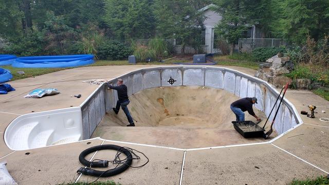 The liner has been removed and our team is smoothing the pool floor and removing any roots or rocks!