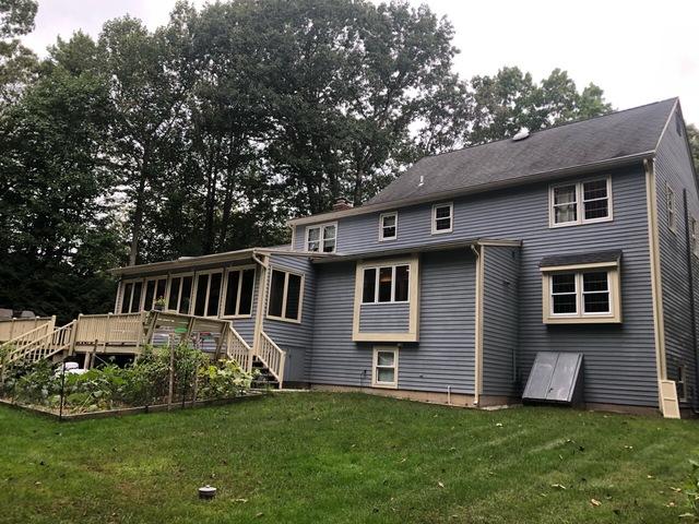 Back deck was also included in this power washing project.