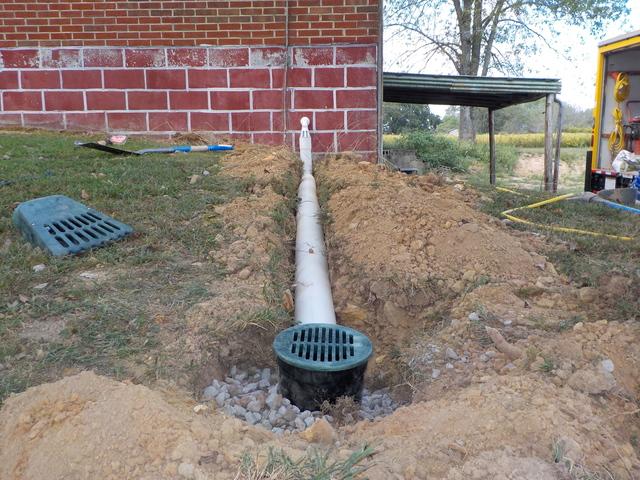 This outlet is green to better camouflage with the surrounding green grass. Plus, it has a removable top for easier access to debris.