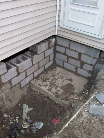 Woodford Bros., Inc. replacing the foundation wall, outside view