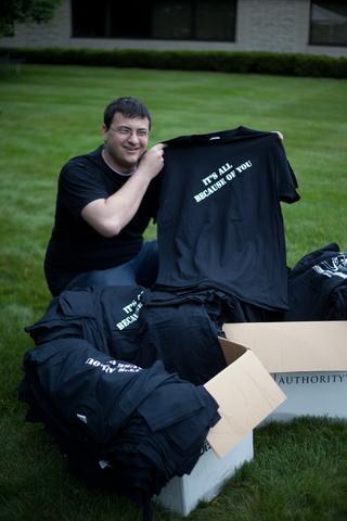 Nick showing off the shirts