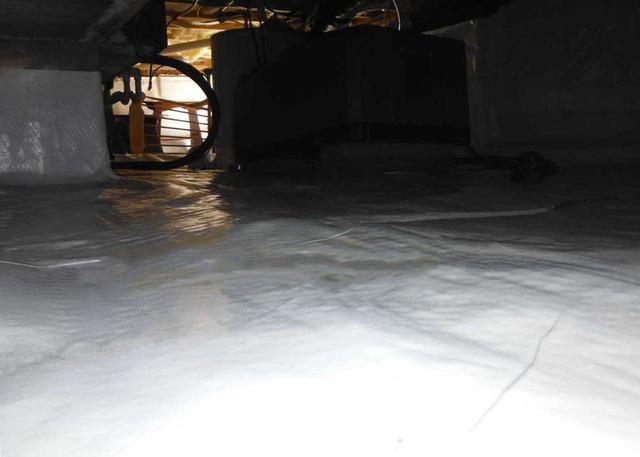 A completed CleanSpace Encapsulation System should make the crawl space nice and bright, providing excellent coverage against water vapor entering the crawl space.