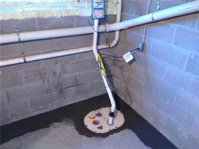 TripleSafe Sump Pump installed to drain water out of the basement. This product is energy efficient and works with the Waterguard installed around perimeter of basement, to keep this basement dry!