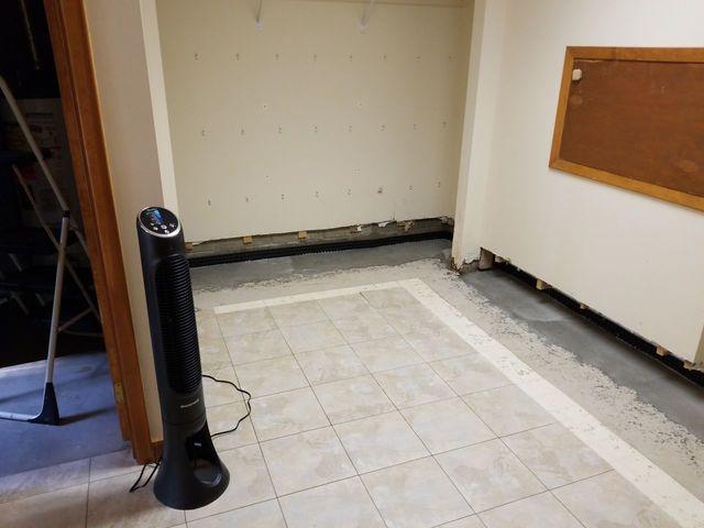 This basement had suffered water damage at the bottom of the walls.