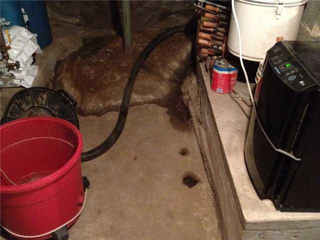 Wet Basement Floor in Plymouth, CT