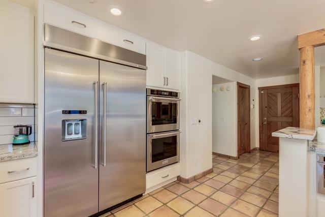 Starmark Cabinetry, Dove color, Stratford door style, Maple species, Soft close doors and drawers. Cambria Seagrove Quartz countertops.