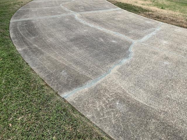 Driveway Leveled and Sealed