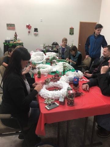 Everyone together working diligently on their wreaths. We take crafting very seriously around here!