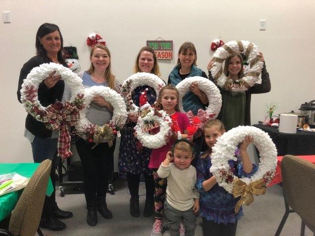 Voila! The final fruits of our labor. The craft squad showing off some beautiful loop yarn wreaths.