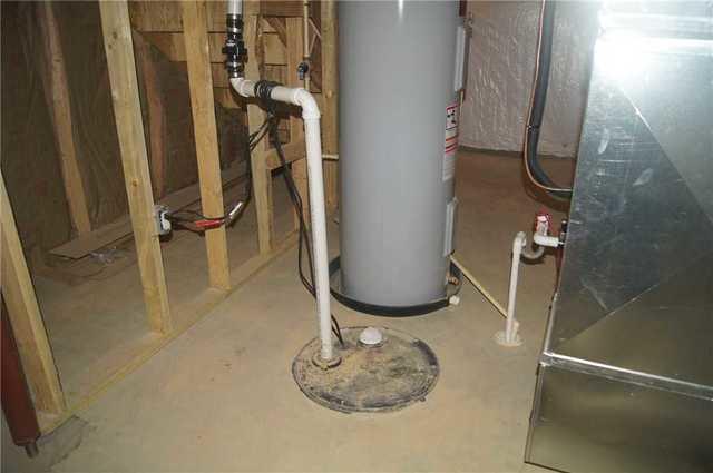 Before photos with an existing pump before upgrade to our TripleSafe Sump Pump.