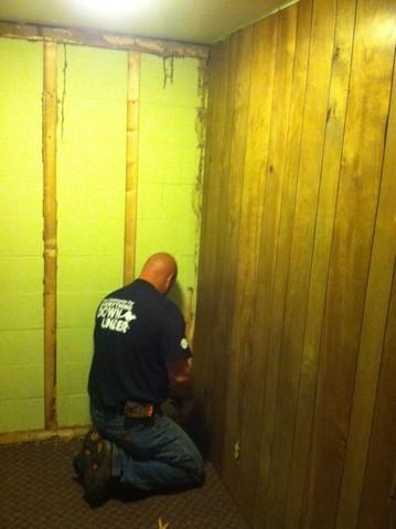 Drywall being removed from Leitchfield, KY Basement