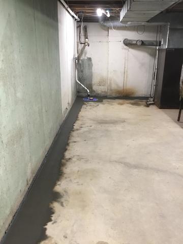 water seeping into basement floor