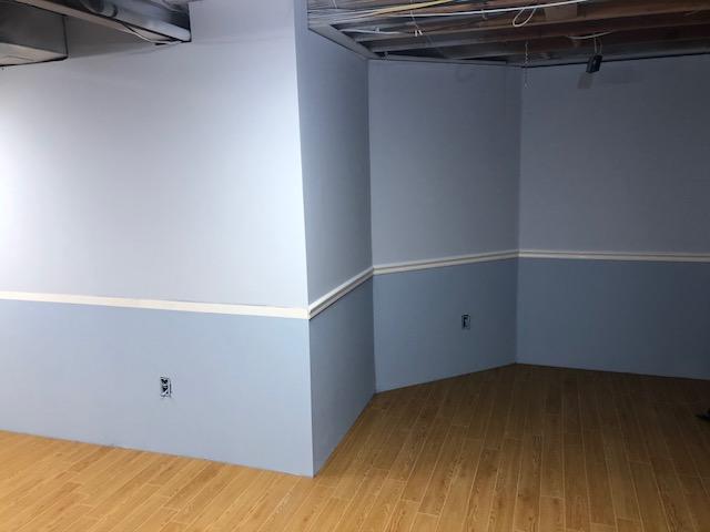 After Photo. Look at that floor against the baby blue walls!