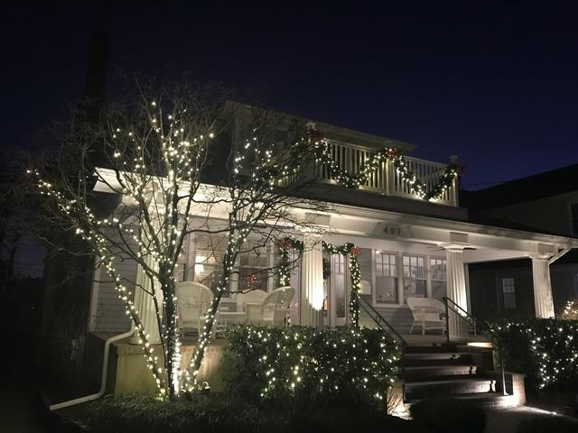 This Jersey Shore home has a beautiful light display  that is both festive and elegant