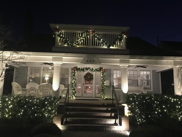 This Jersey Shore home has a beautiful light display  that is both festive and elegant