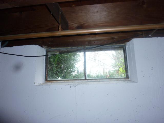 <p>The basement of this Cornwall, CT home had an old steel framed window. These old windows are often leaky and very inefficient. They allow cold air to enter the home in the winter and hot, humid air to enter in the summer. We recommend replacing these old windows with our EverLast Basement Windows. They are vinyl-framed and made with double-paned, low-E glass. This makes them much more energy efficient, saving the homeowners money in heating and cooling bills.</p>