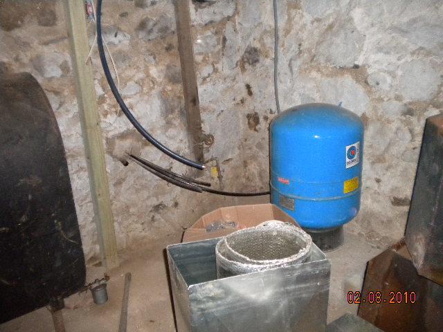 This Riverton, CT basement had a water problem, common in basements with fieldstone foundations. To prevent future water damage, we installed our SuperSump® Premier Pump System. This powerful cast-iron sump pump can remove up to 2,500 gallons of water per hour from the basement, keeping it dry for the homeowners to enjoy.