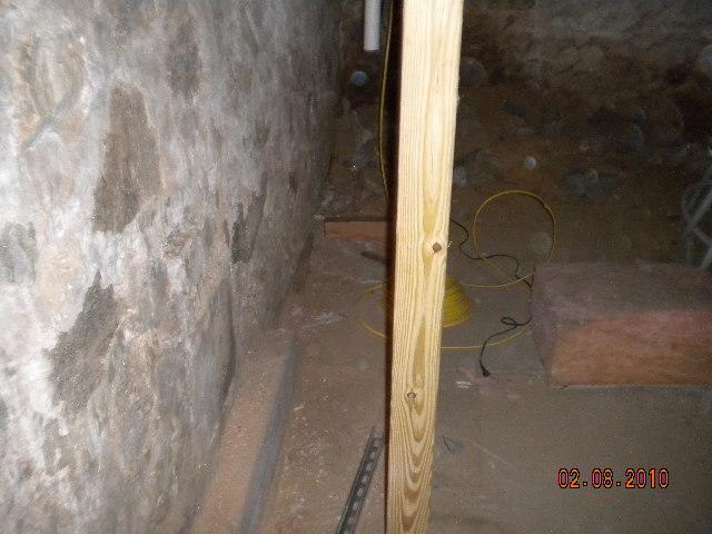 The basement of this Riverton, CT home had exposed field stone foundation walls. To give it a more finished look, we installed our CleanSpace Wall System throughout the basement. This waterproof vapor barrier keeps the basement dry while its bright white surface reflects all available light. It brightens the area and makes the room much more visually appealing. 