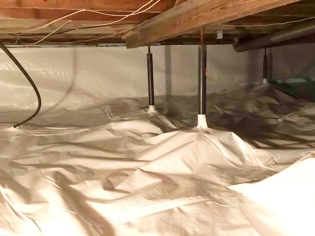 <p>CleanSpace used for complete crawl space encapsulation, while Smart Jacks provide stabilization support for sagging floor above.</p>