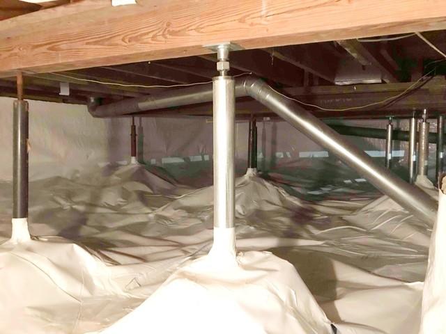 <p>SmartJacks installed to stabilize uneven floors above crawl space</p>