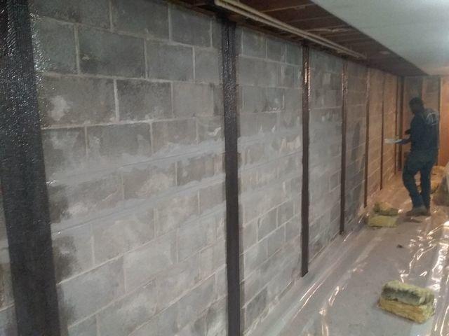 Leaning walls straightened with Carbon Armour strips