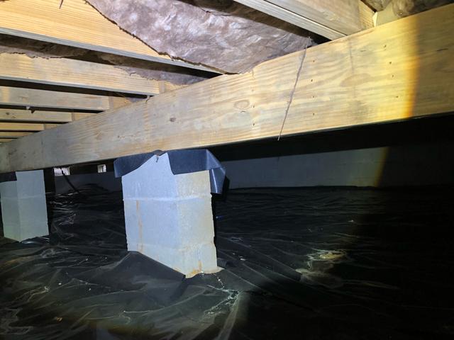 Unwrapped piers are a source for moisture and pests to enter the crawl space from the earth.