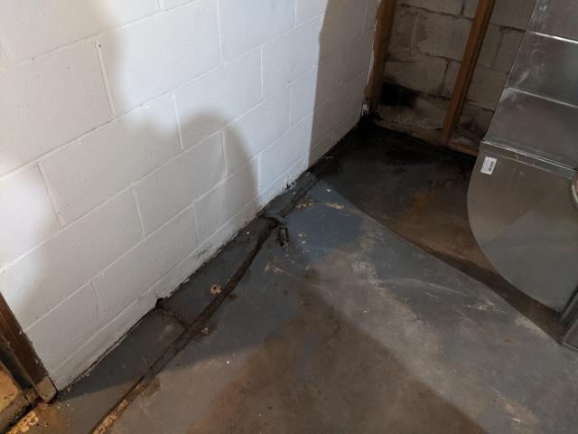 This photo shows right where water was entering and causing the floor to be wet.