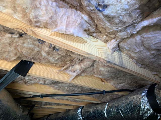 As moisture enters the crawl space, fiberglass insulation soaks it up like a sponge. It holds the water against the joists and the rods used to hold it up. Over time, the moisture in the material rusts the rods keeping it in place, it begins to separate from itself, and with the help of gravity, falls to the ground.