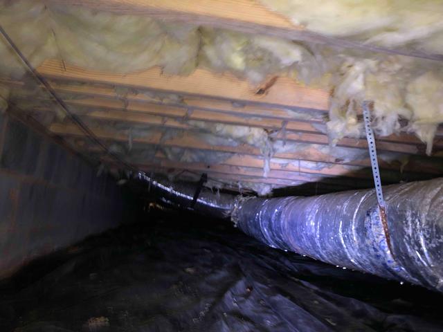 Fiberglass insulation in crawl space