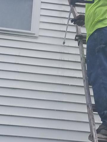 Pressure Washing on Ladder