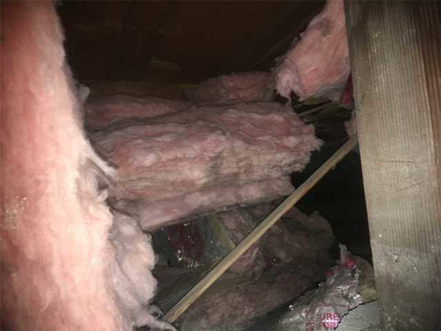 Full bats of fallen insulation