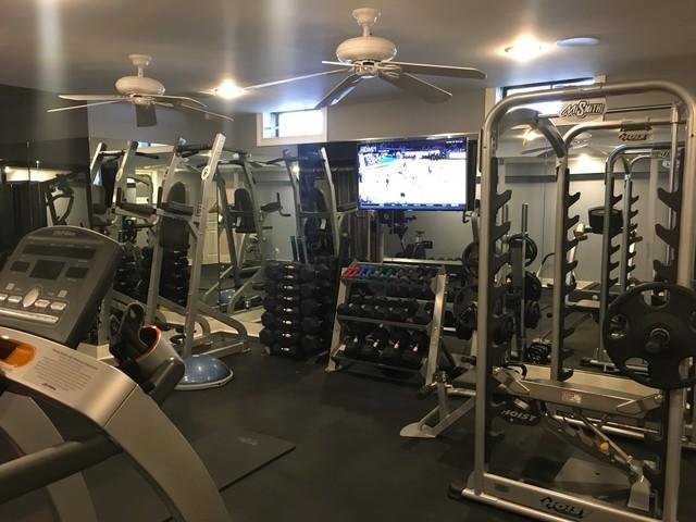 TV's, speakers and music now complete this awesome home gym!