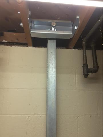 PowerBrace® Beams Installed Along Perimeter of Basement
