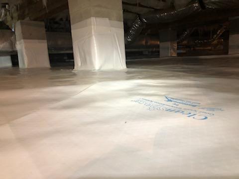 The CleanSpace Vapor Barrier is a heavy-duty 20-mil liner, similar to a pool liner. When it is installed, we overlap and seal all edges, bring it up the foundation walls 6-8 inches above outside grade, and wrap all piers. The liner is sealed to the walls and the piers, isolating the crawl space from the earth's moisture.