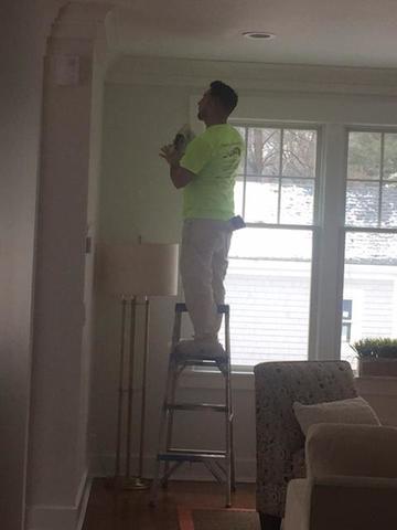 Crew Leader Romulo is meticulous when he's painting a customer's home.