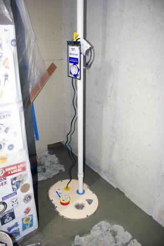 The sump pump is ready to pump out any water that enters the basement.