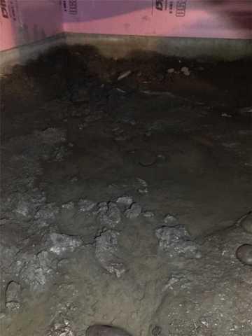 wet, muddy crawlspace