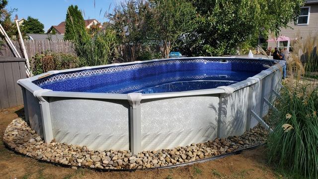 The finished product! The pool was backfilled and a rubberized coating was applied to the entire bottom exposed portion of the pool to prevent this from happening again in the future!