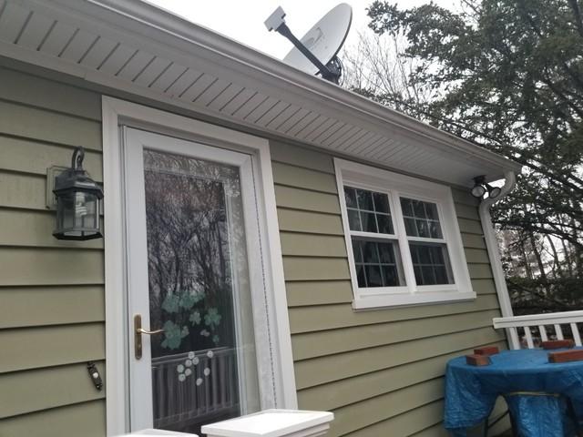 The front door and window trim look squeaky clean after pressure washing.