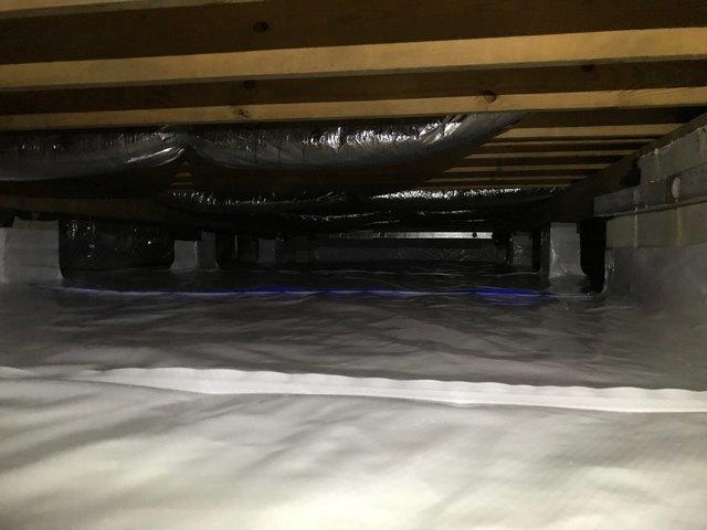 Isolating the crawl space from the earth