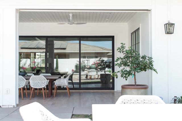 The client wanted to bring more of the natural sunlight into the main home areas in which this three panel sliding door by Milgard was the perfect choice.