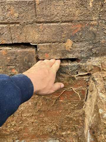 The base of the home started showing extreme cracking