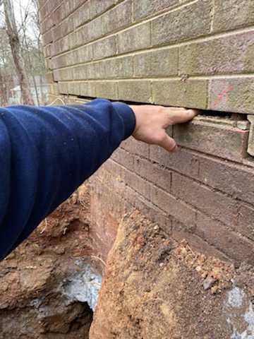 The cracking on the back wall of the home extended down its entirety.