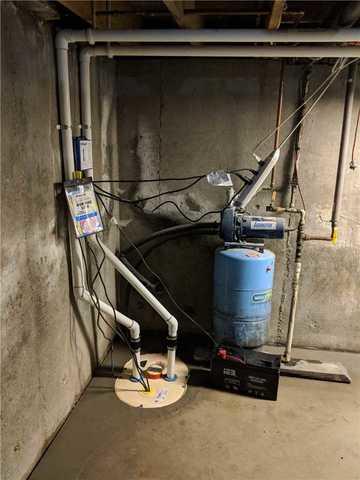 With the TripleSafe sump pump this basement has three levels of protection in just this one sump! One is a battery powered backup pump that will kick on if the home loses power.