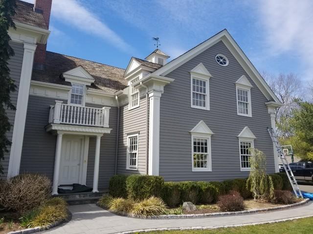 The new gray shade is perfect after painters added the last coat to the exterior.