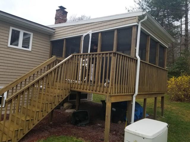 Power washing the back side of this Danbury home.