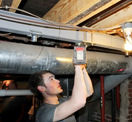 Foreman Nolan installing steel beam for SmartJacks