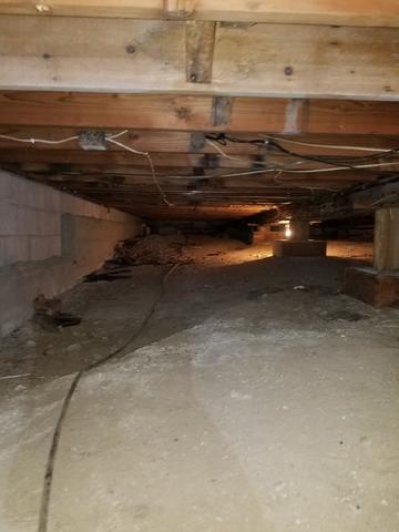 Before Photo of Unfinished Crawl Space