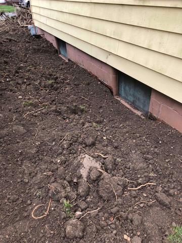 Now that everything has been installed, you can't tell that there were ever foundation issues at this house besides the little bit of dirt there is to show for it. They also have the peace of mind knowing that their foundation is safe and stable.