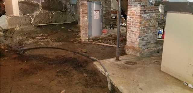 Crumbling Dirt Floors Soak up Moisture